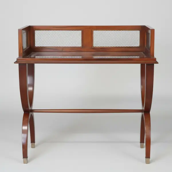 Full front view of Madison Mahogany & Brass Cocktail Table with mahogany frame, brass mesh panels, and curved legs