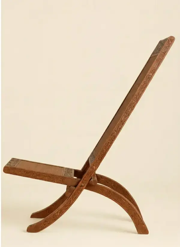 Maharaja Hand-Carved Folding Chair – Solid Mahogany with Cane Seat Maharaja Hand-Carved Folding Chair in solid mahogany with woven cane seat and intricate Anglo-Indian carving