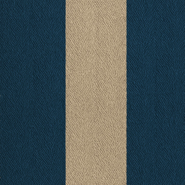 Mariner Indigo Stripe fabric with bold indigo and sand bands, hand-loomed herringbone weave for upholstery and cushions