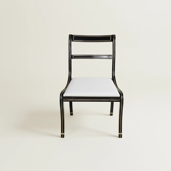 Elegant Regency Ebony Gold Side Chair – Front View Elegant Regency Ebony Gold Side Chair in solid mahogany with gilt black finish and upholstered cushion, front view