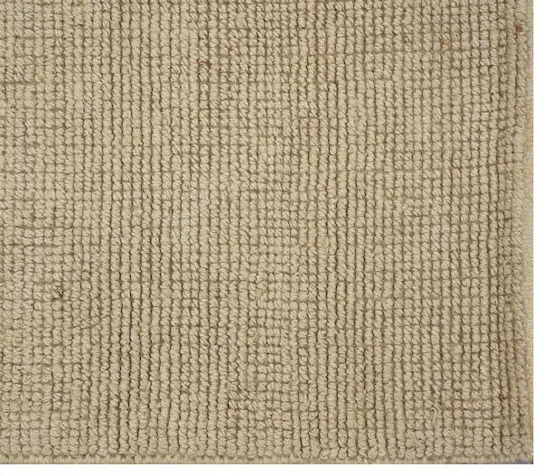 Close-up texture of Sandstone Brae Handwoven Jute Rug natural fibers