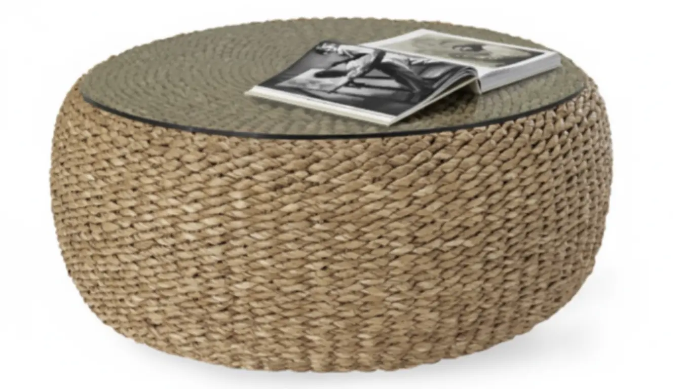 Devon Woven Cocktail Table – Handwoven Lampakanay with Glass Top Side view of the Devon Woven Cocktail Table with handwoven lampakanay fiber base and tempered glass top, styled with magazine – luxury woven coffee table