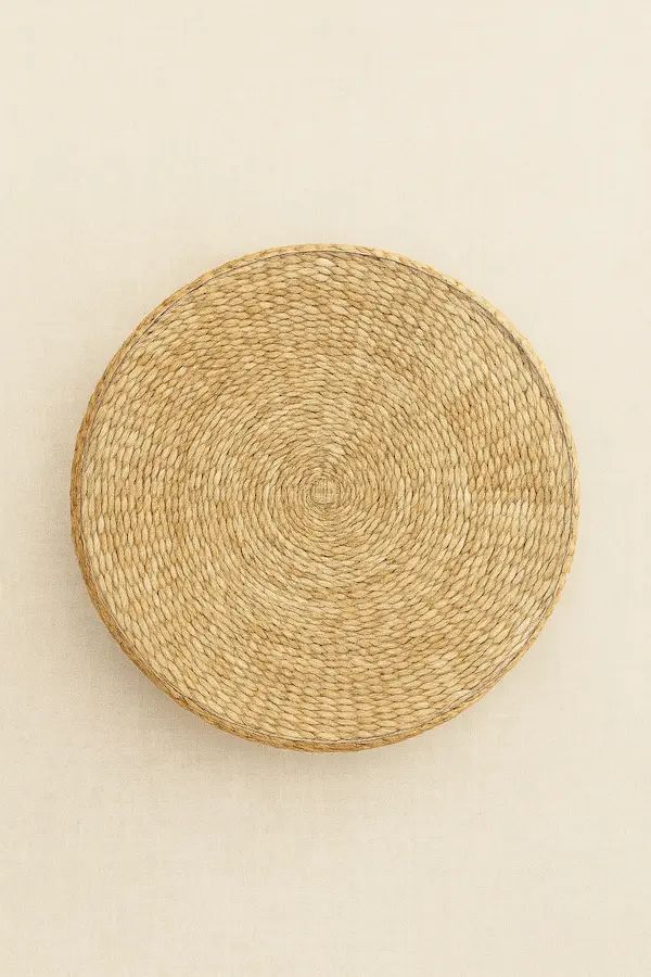 Devon Woven Cocktail Table – Handwoven Lampakanay with Glass Top (Top View) Top view of the Devon Woven Cocktail Table showing the circular handwoven lampakanay pattern beneath the tempered glass surface – round woven cocktail table