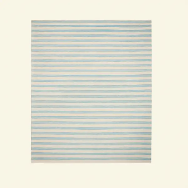 Newport Azure Stripe Wool Flatweave Rug | Reeva Sethi Home Handwoven blue and ivory stripe wool flatweave rug, low-pile kilim texture with bound edges, Reeva Sethi Home