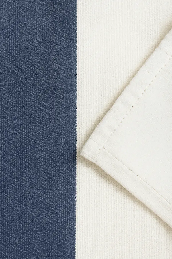 Close-up of Blue and White Beach Blanket cotton weave and hem stitching