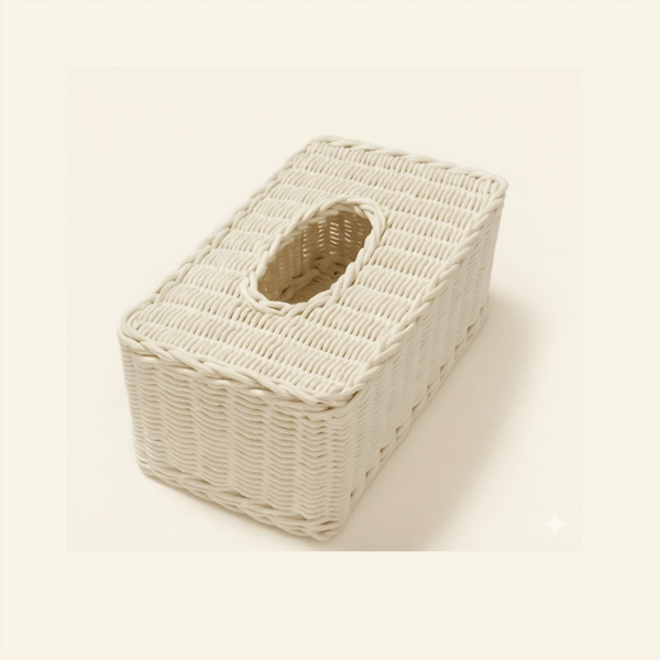 Laguna Handwoven Rattan Tissue Box Cover – Ivory Silk Ivory Silk handwoven rattan tissue box cover with oval opening, rectangular design, by Reeva Sethi Home.