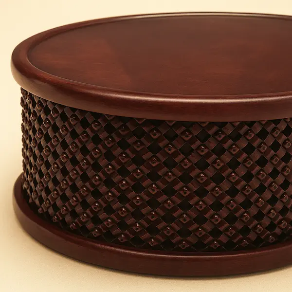 Bamileke Drum Table – Lattice Carving Detail Close-up of Bamileke Drum Table showing mahogany lattice carving detail