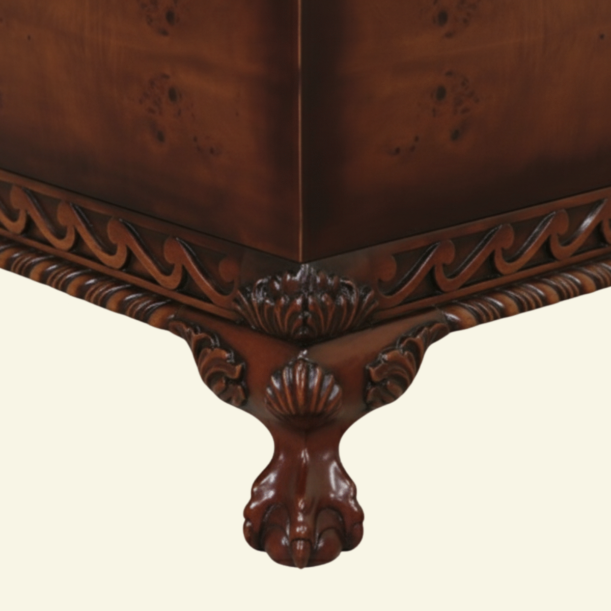 Close-up view of Dayton Coffee Table showing carved vine apron and antique brass drawer handle