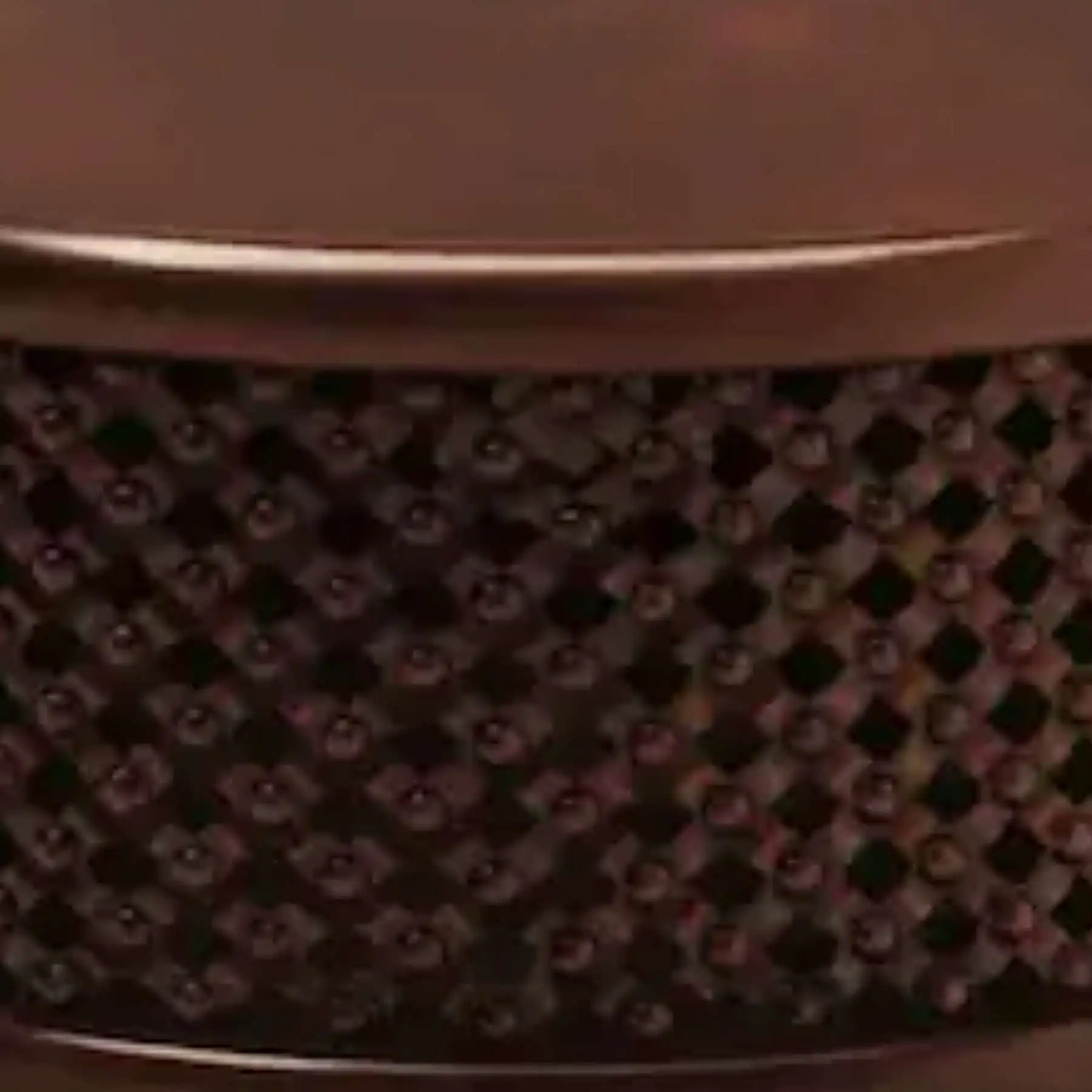 Bamileke Drum Table 2 Close-up of the hand-carved openwork lattice on the Bamileke drum table, with raised knobs, diamond openings and a polished mahogany rim