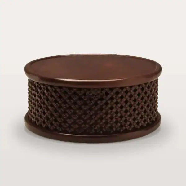 Bamileke drum coffee table hand-carved in solid mahogany, with a polished round top over an openwork lattice drum, 39 inches across