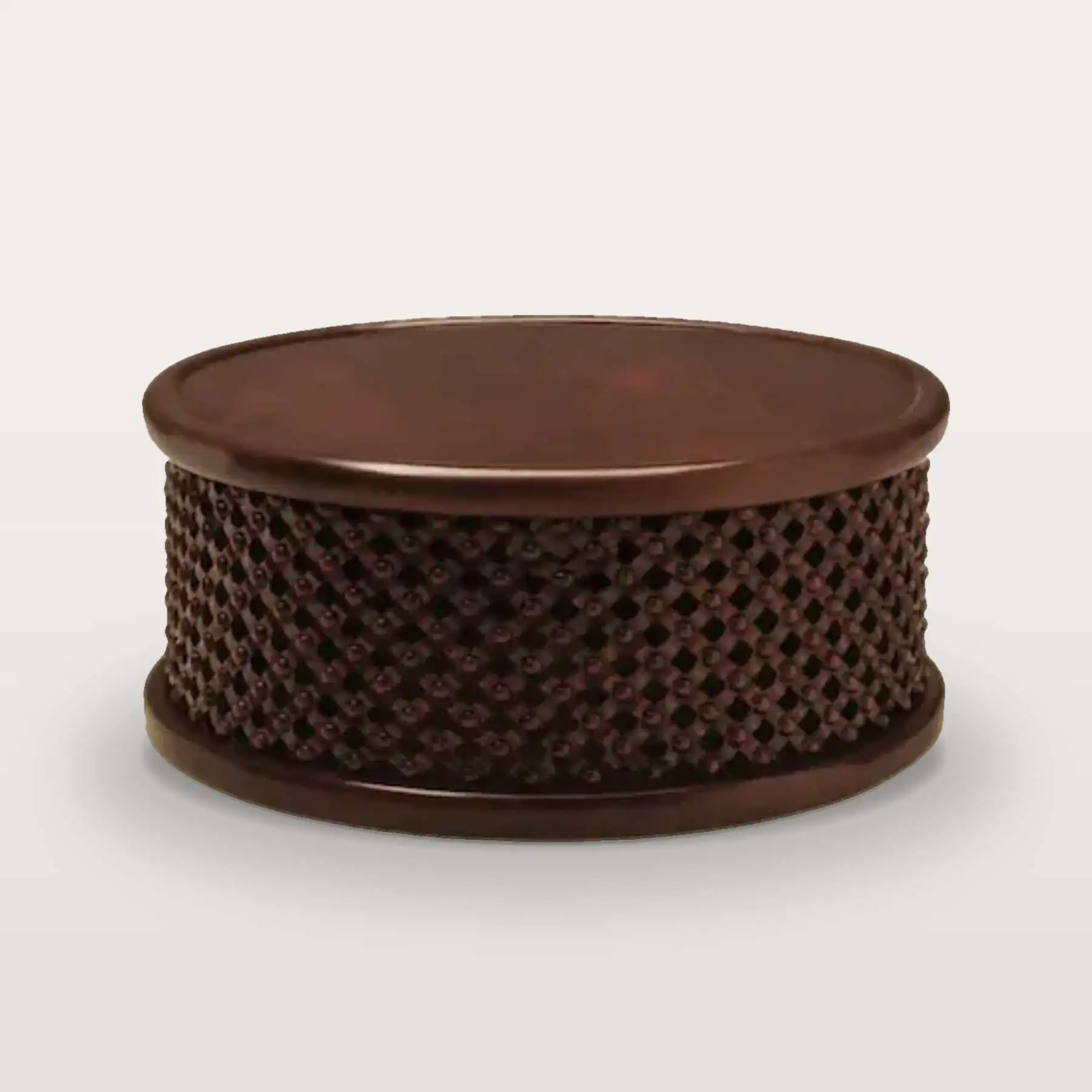Bamileke Drum Table 1 Bamileke drum coffee table hand-carved in solid mahogany, with a polished round top over an openwork lattice drum, 39 inches across