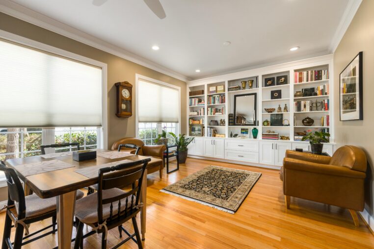 Elegant Menlo Park living room featuring built-in bookshelves and sophisticated furnishings