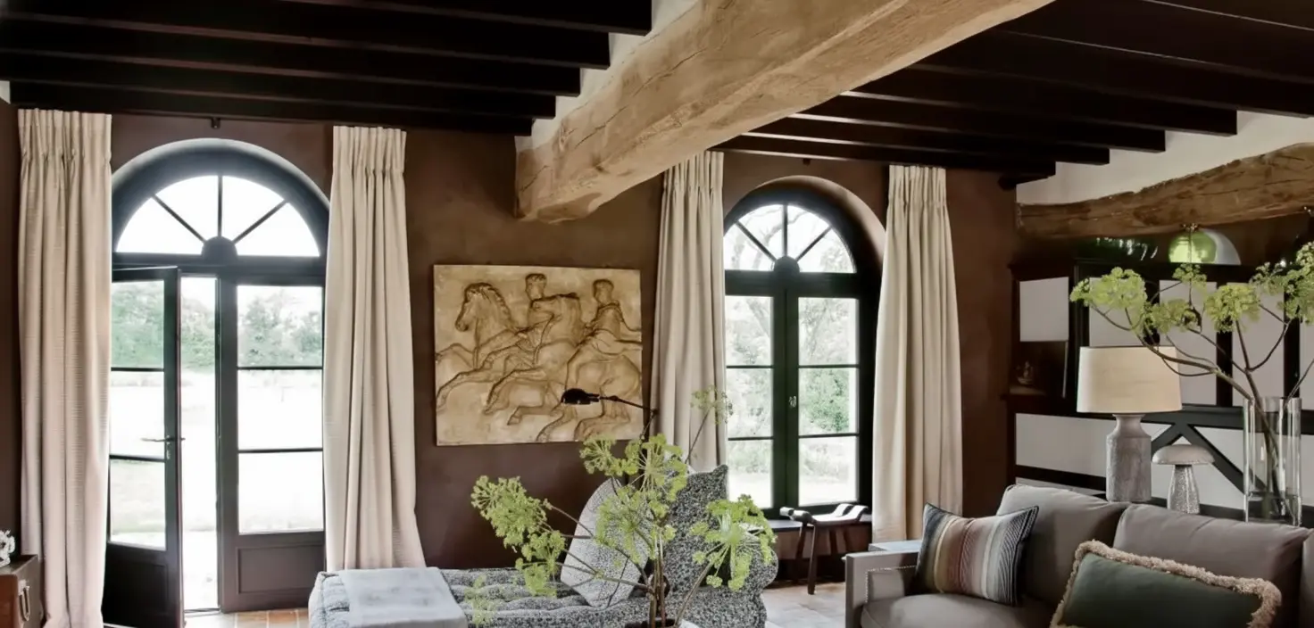 Refined ceiling detail with beams adding structure and quiet classical order