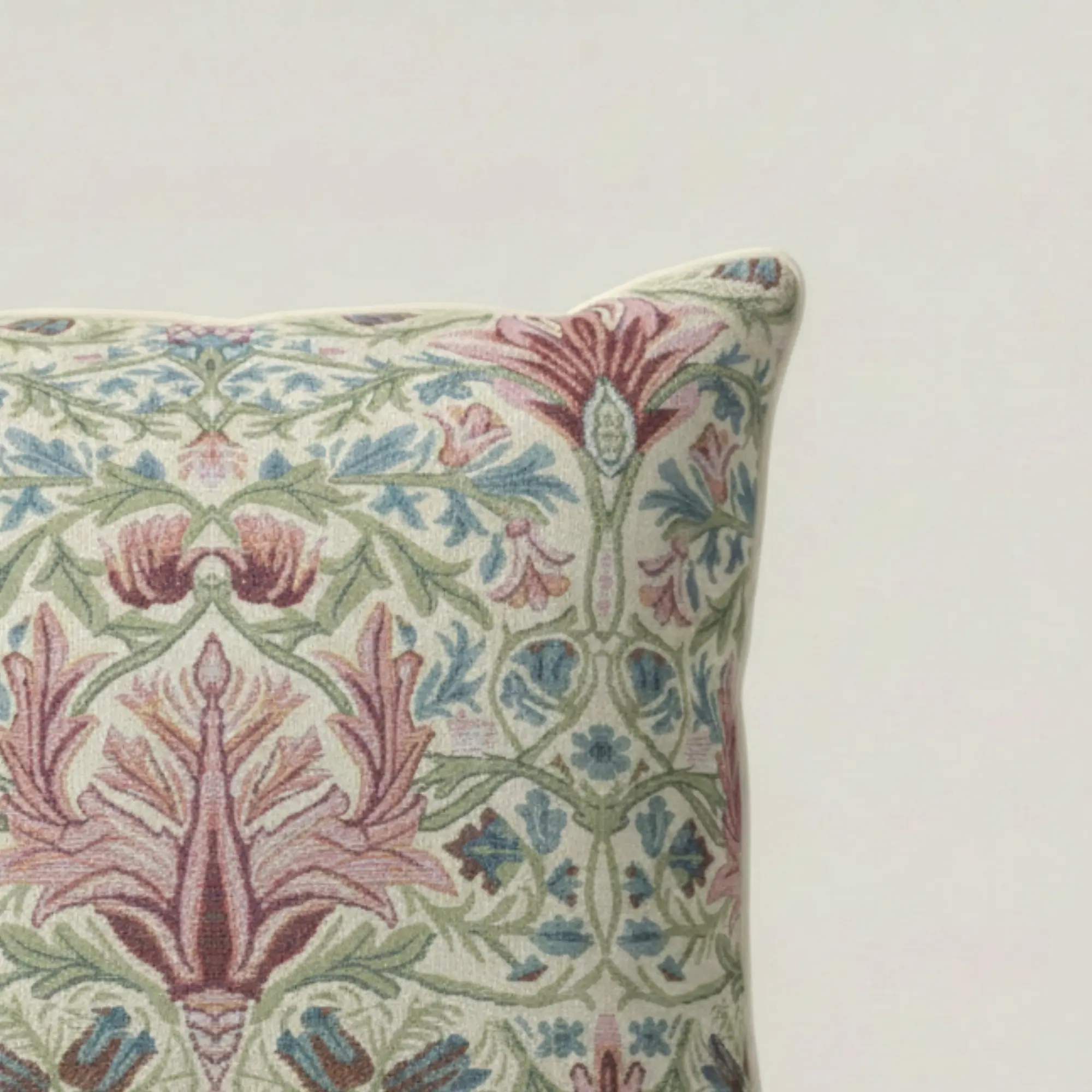 Corner detail of Garden Tapestry Throw Pillow showing structure and tailoring