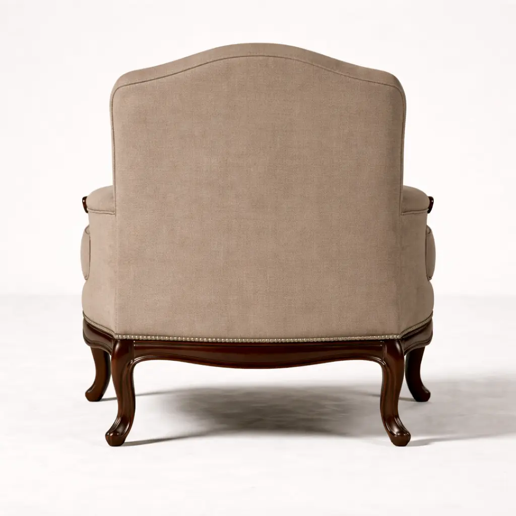Back view of Montreux bergère chair showing fully upholstered back panel and carved mahogany base — demonstrating 360-degree finish for open-plan placement