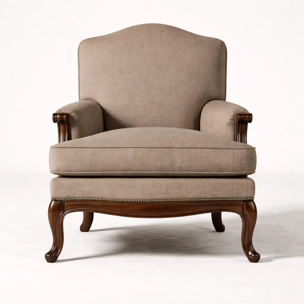 Front view of Montreux bergère chair: upholstered seat cushion and back panel set inside carved mahogany frame with enclosed arms — RS Studio, Saratoga California