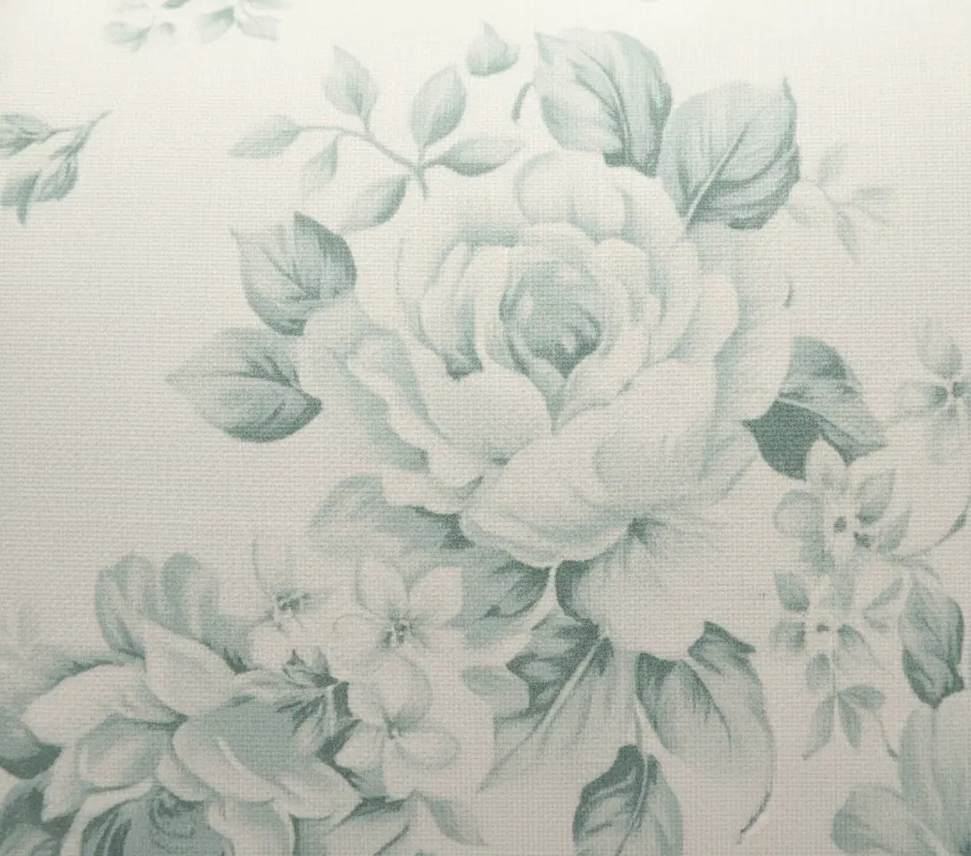 Close-up of vintage rose floral print on linen throw pillow fabric