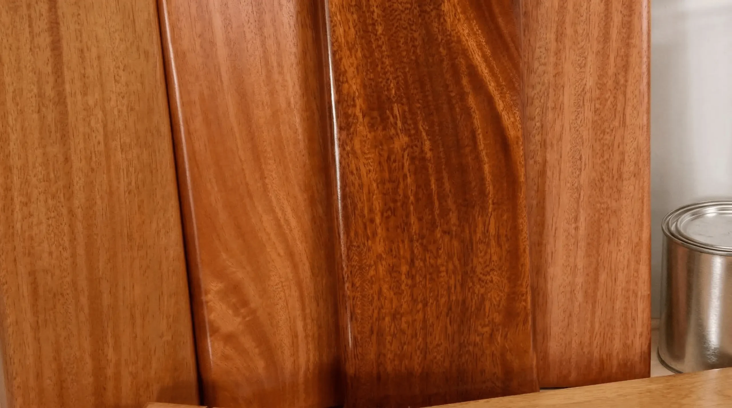 Polished mahogany veneer samples — tonal variation and restrained grain