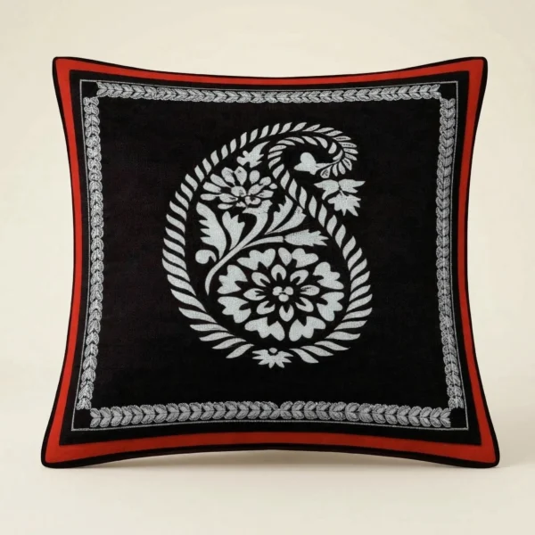 Briarfield Script throw pillow with embroidered botanical motif and contrast piping on dark ground