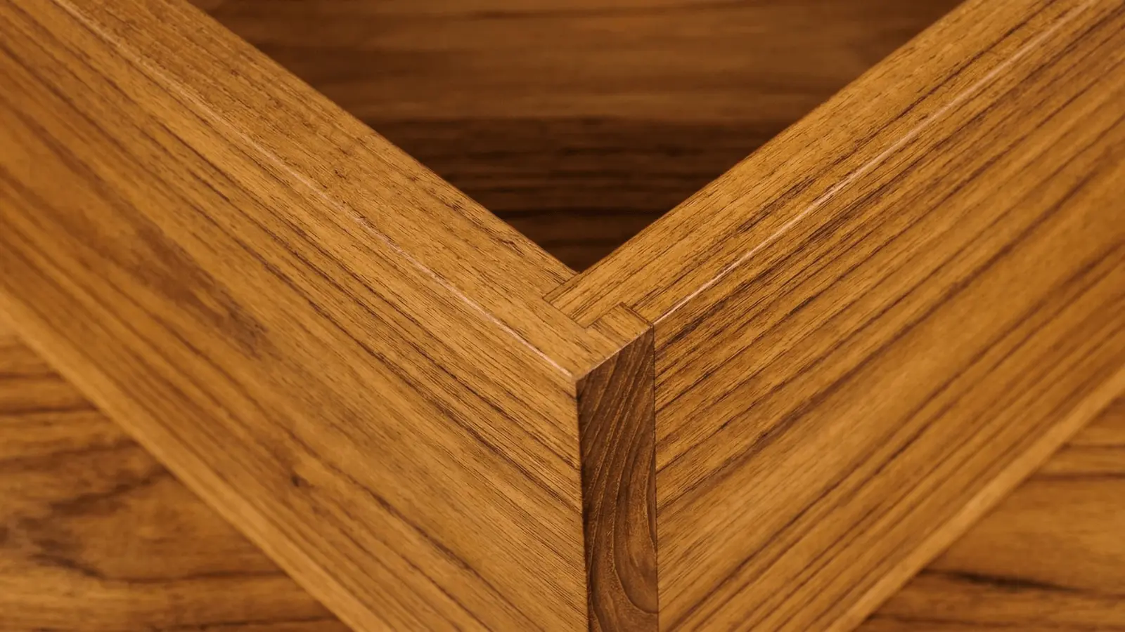 Reinforced furniture corner joint with a fitted wood spline for strength and stability