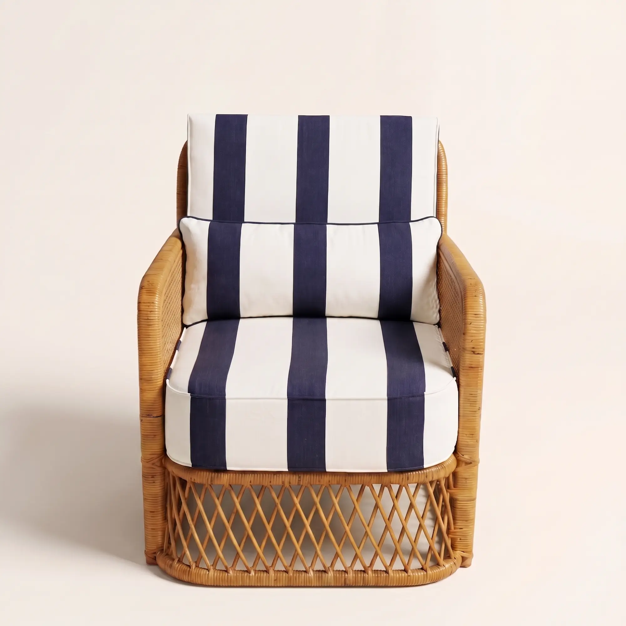 Montauk Cabana Lounge Chair 2 Front view of Montauk Cabana Lounge Chair with navy striped cushions and woven rattan detailing