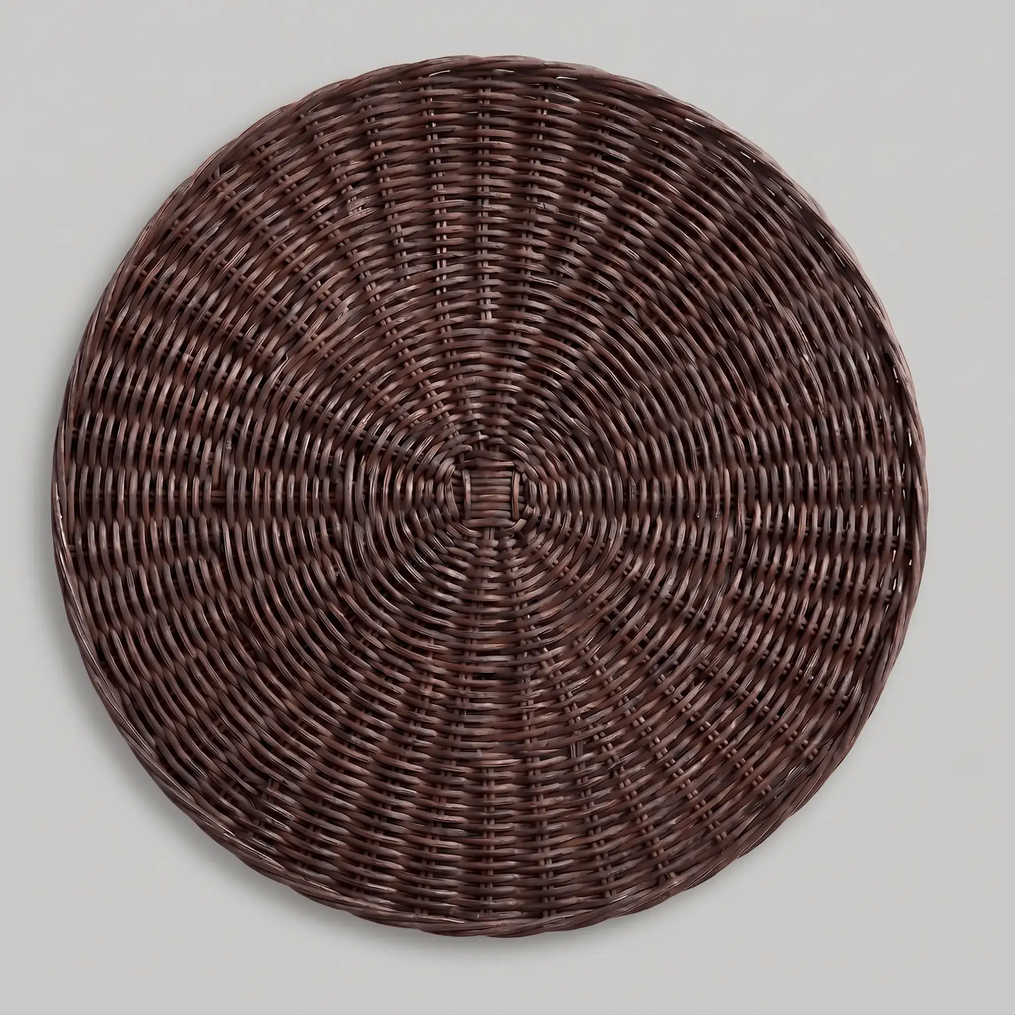 Montecito Round Rattan Placemat 1 Montecito Round Rattan Placemat in dark brown handwoven rattan