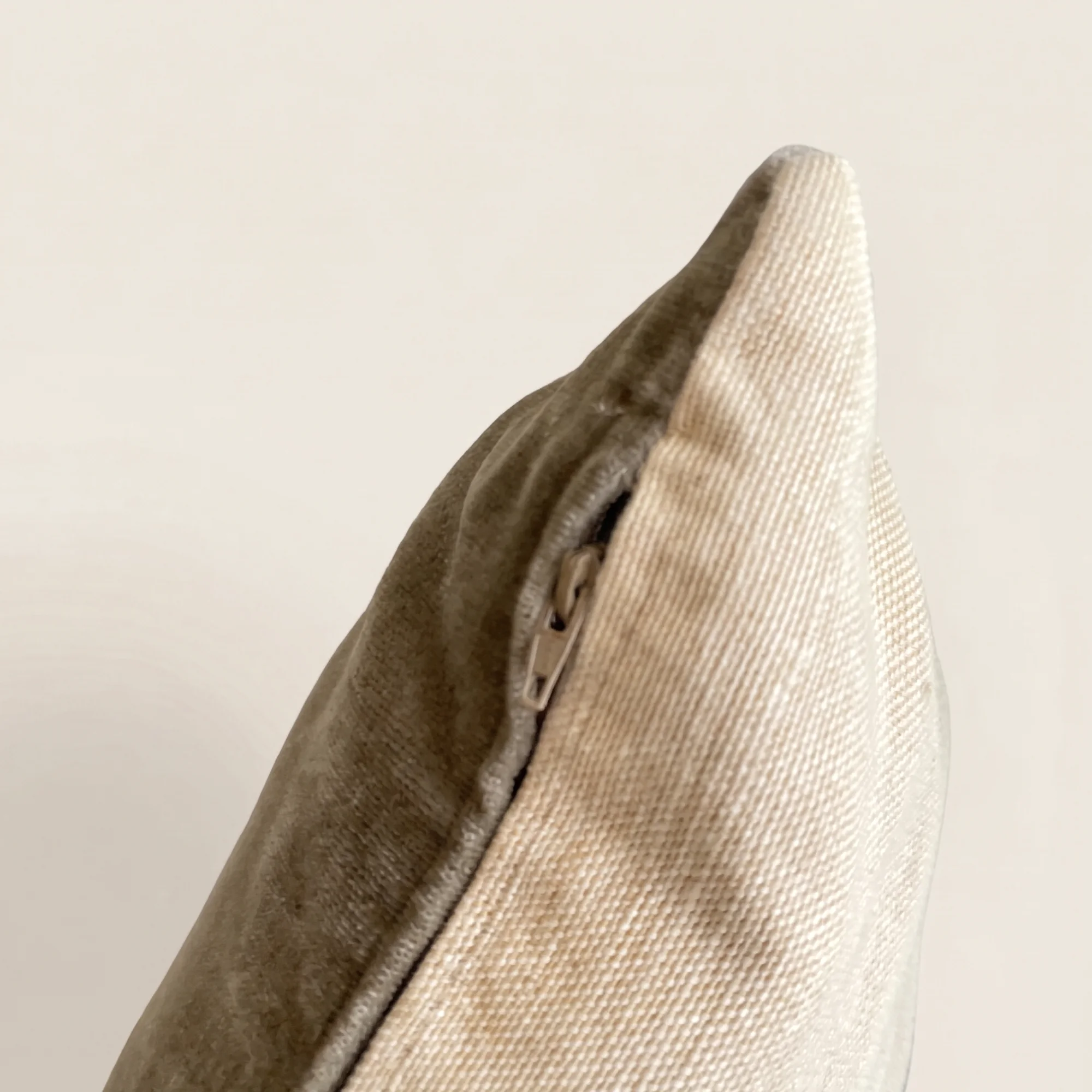 Close-up of the Balmoral Stag Throw Pillow corner showing the velvet back, woven front and zipper pull
