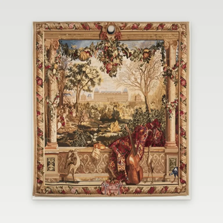 Château Hunt handwoven wool tapestry showing a château and hunting party framed by columns, a fruit swag, a balustrade with a viol and a rose border