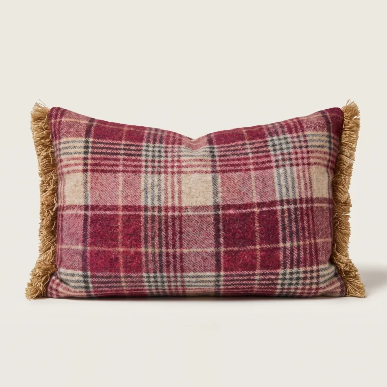 The Falkirk Plaid Lumbar Cushion Cover front, a burgundy, cream and charcoal wool plaid with gold knotted fringe on the short sides