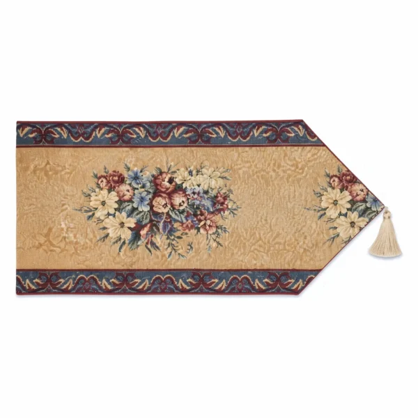 Festival Flowers jacquard table runner in golden ochre with cream daisies, dusty pink roses and cornflower blue, cranberry and slate border, cream tassel at the pointed end
