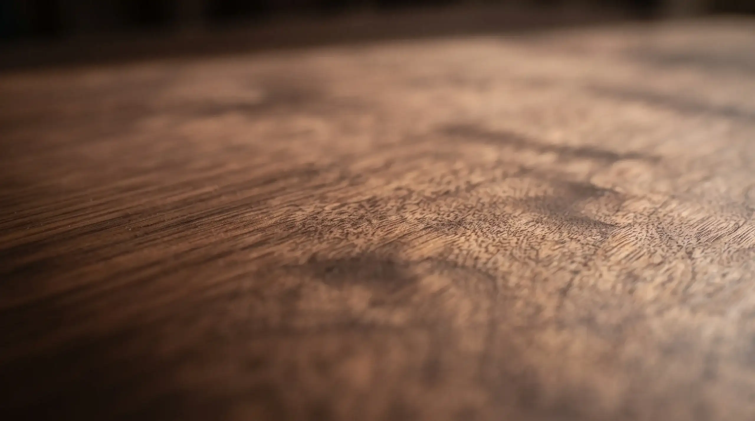 How to Tell If Furniture Is Well Made | A Field Guide to Craftsmanship 4 Close-up of a hand-applied finish revealing the natural grain and depth of solid walnut furniture